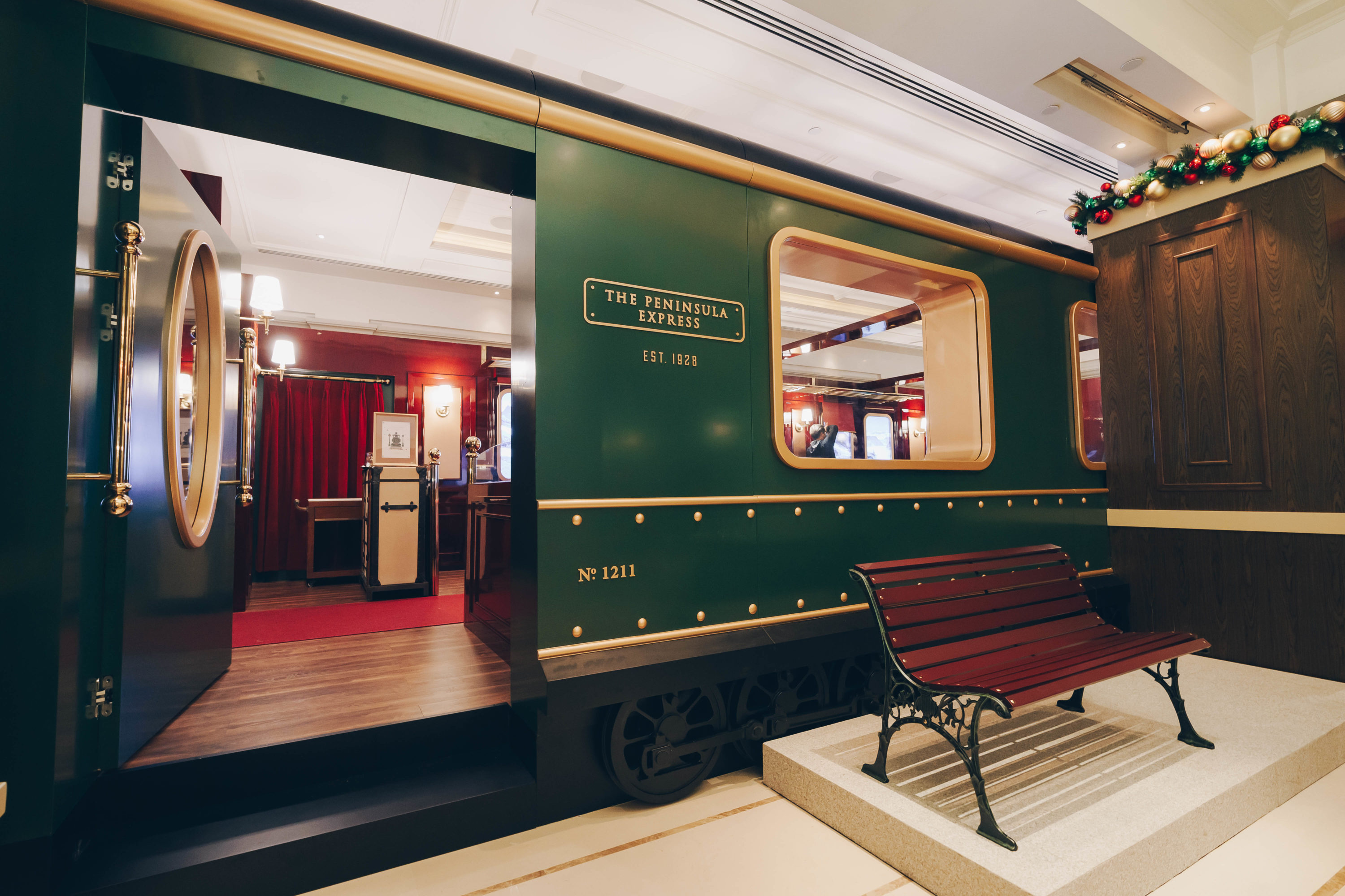 festive meal in a train carriage at the peninsula