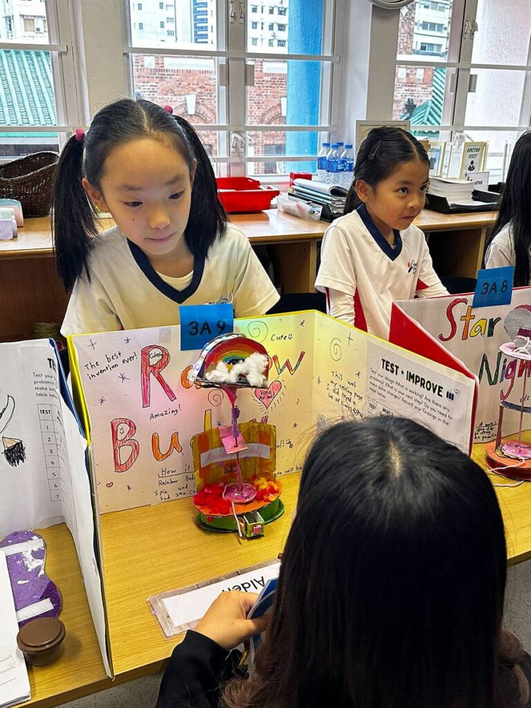 Primary students participating in inquiry-based IPC learning at YMCA Christian Academy