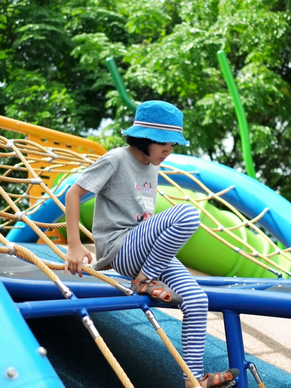 Image of girl on climbing net at Admiralty Park - outdoor playground singapore