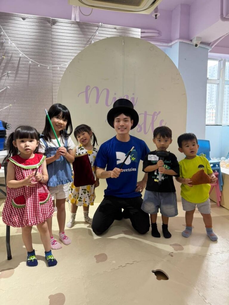 Dove Tales magician with kids at a birthday party in Hong Kong