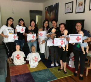 Image of helpers with first aid certificates - domestic helper course singapore
