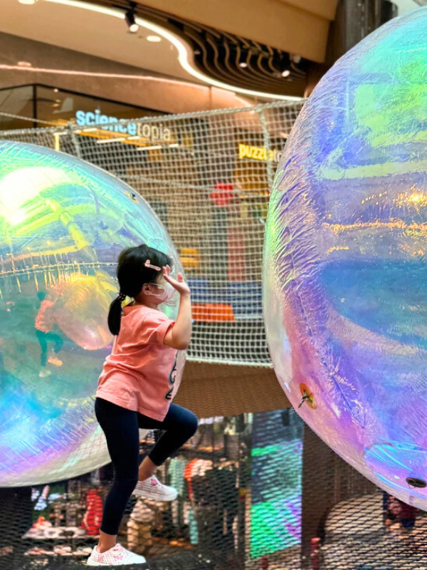Girl playing with AIRZONE ball in Singapore Little Steps