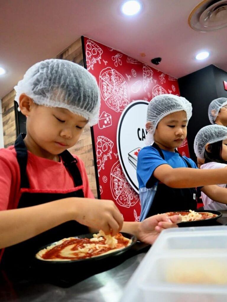 Image of kids making pizza at KidZania Singapore - indoor playground singapore