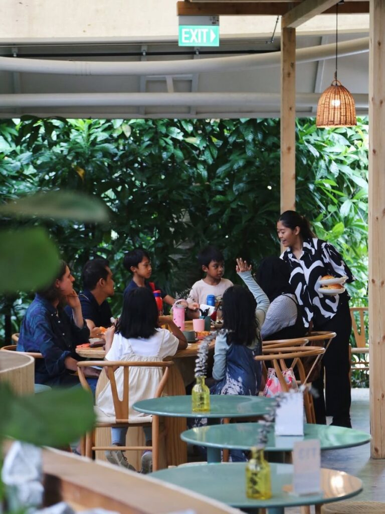 Image of kids and seating at Small Batch at Jacob Ballas Children's Garden - cafe in park singapore