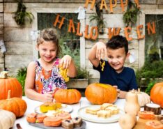 Image of kids carving pumpkin - Halloween pumpkin Singapore