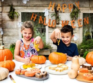 Image of kids carving pumpkin - Halloween pumpkin Singapore
