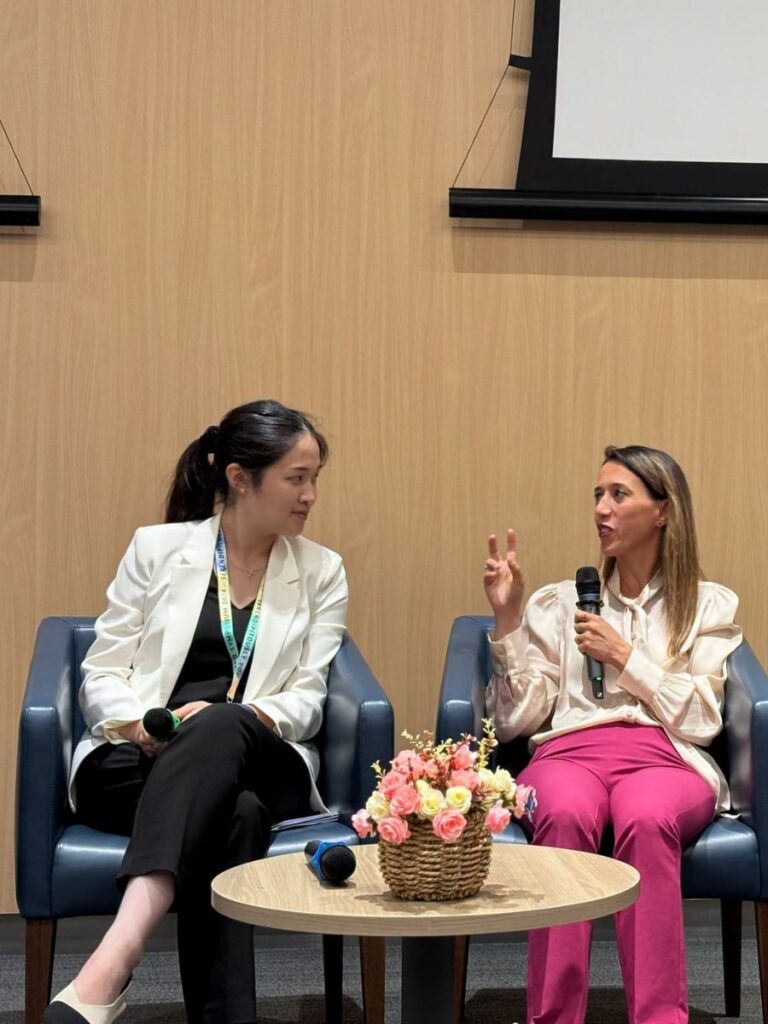 Image of women talking at forum - breast cancer awareness event singapore