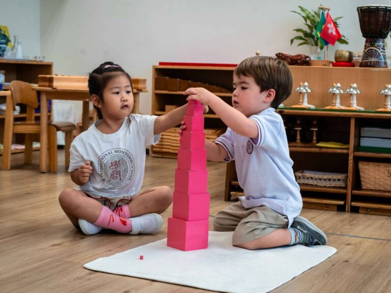 Children engaged in bilingual Montessori learning at IMS Hong Kong