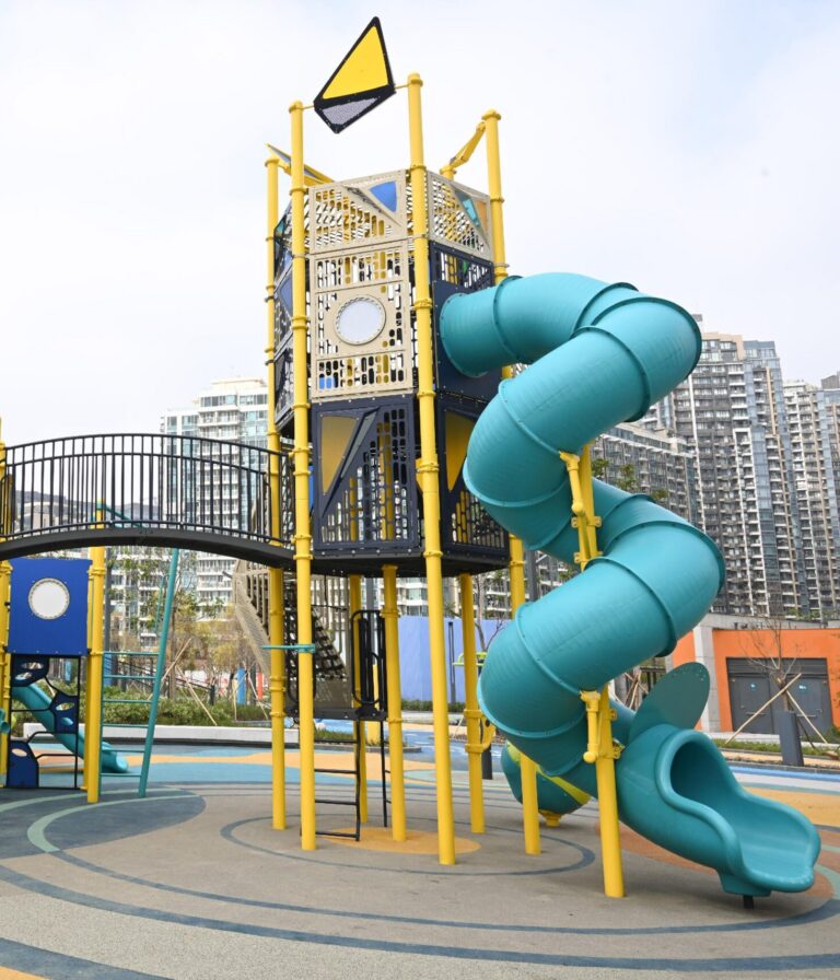 Yellow climbing tower and spiral slide at Tseung Kwan O South Park