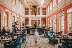 Child standing in a grand, colorful hotel at a family-friendly luxury resort in Phu Quoc, Vietnam.