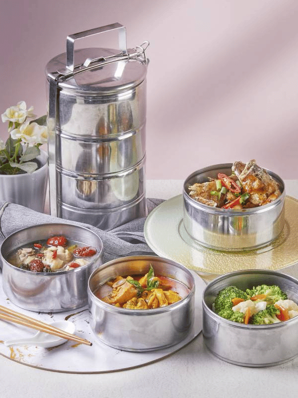 silver tingkat meal options showcasing four dishes in Singapore