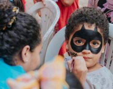 Image of boy getting face painted - Halloween makeup singapore