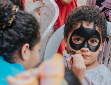 Image of boy getting face painted - Halloween makeup singapore