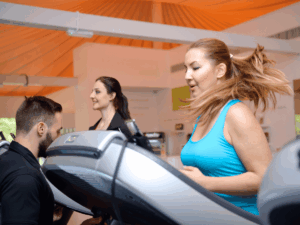 Two women working out on a treadmill in Singapore Little Steps
