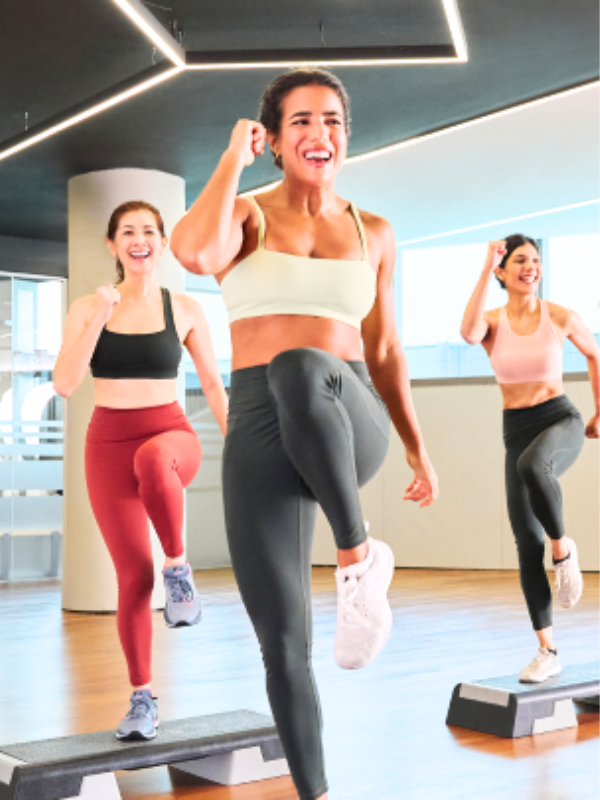 women doing a step class in singapore little steps