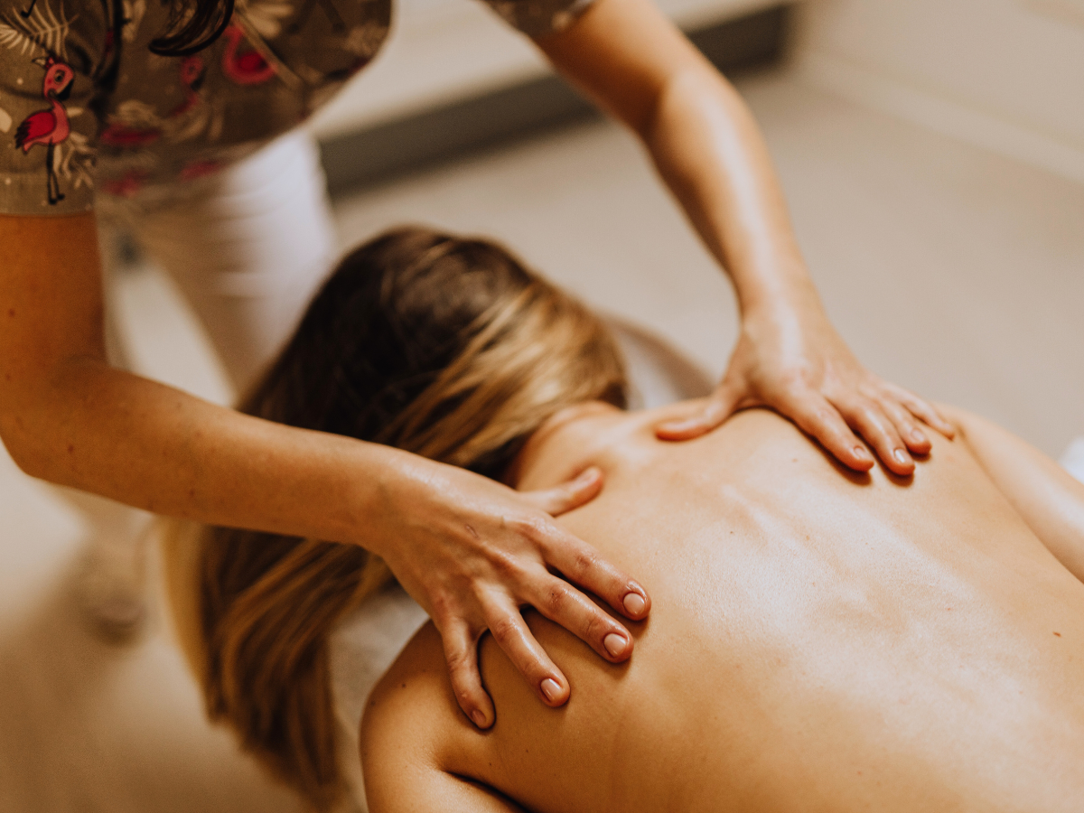 woman receiving myofascial release in clinic