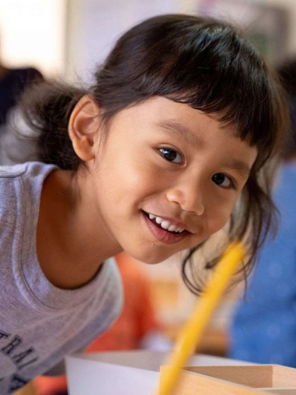 happy student at lodestar montessori school in Singapore