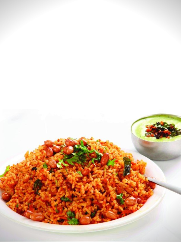 vegetarian rice dish with herb sauce to the side