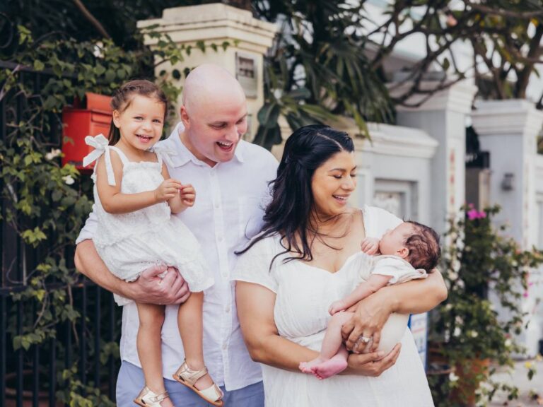 Katie Martin-Sperry photographing a family outdoors in Singapore