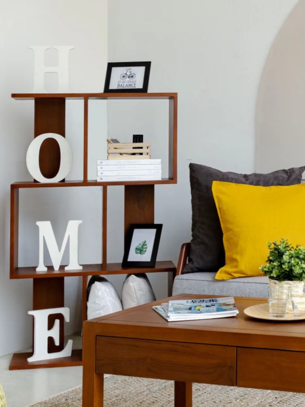 wooden deep colored coffee table and book shelf