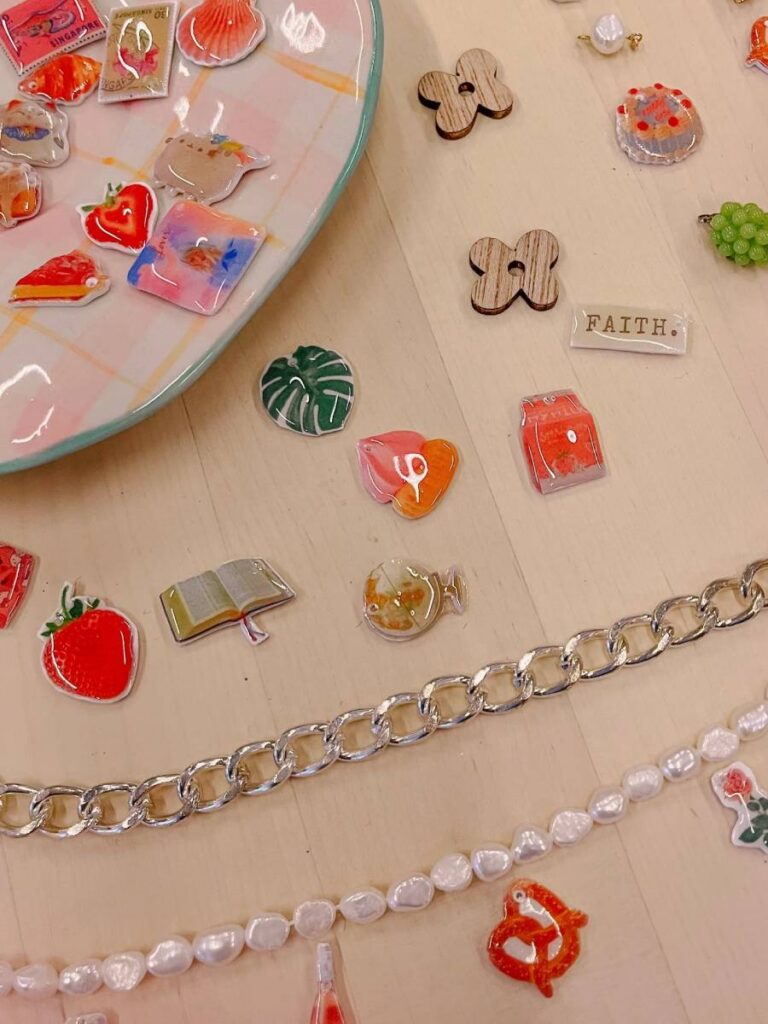 Charm jewelry making workshop with custom charms and tools