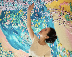 Image of woman eating at edible chocolate garden in Singapore Paragon Mall