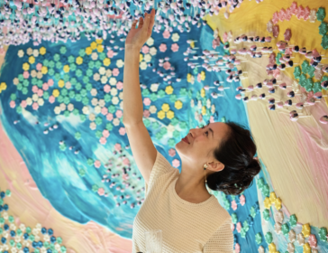 Image of woman eating at edible chocolate garden in Singapore Paragon Mall
