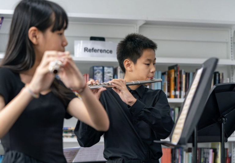 Image of NLCS Passionate student playing music