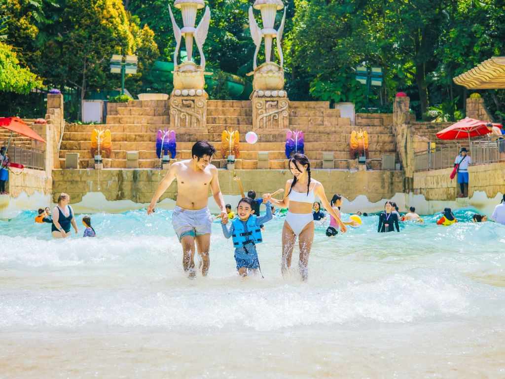 Image of family at wave pool at Adventure Cove Waterpark 
