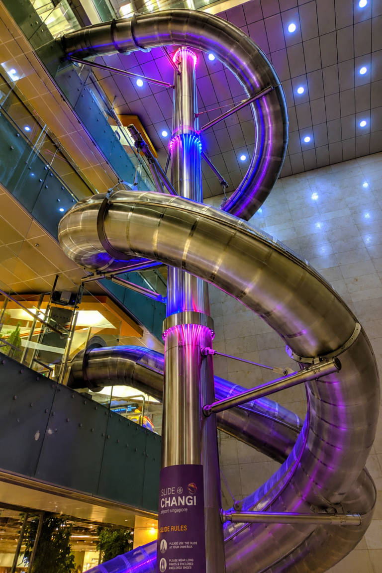 Tall indoor slide attraction for kids at Changi Airport Terminal 3 Singapore