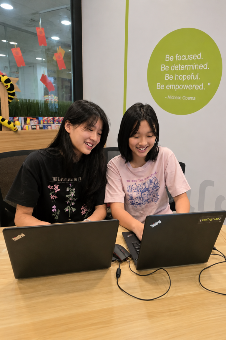 Students learning AI coding and robotics at Coding Lab AI summer camp for kids in Singapore