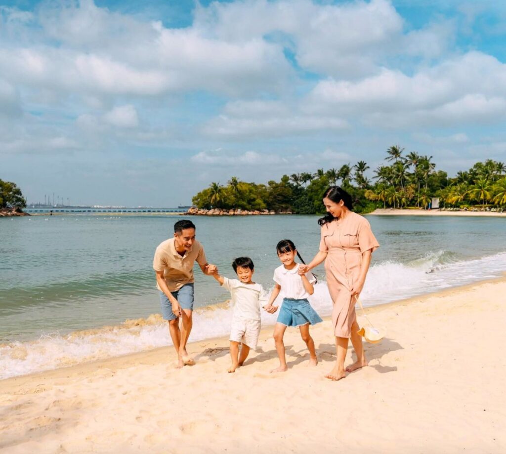 Image of family on Sentosa beach - things to do in Sentosa with kids