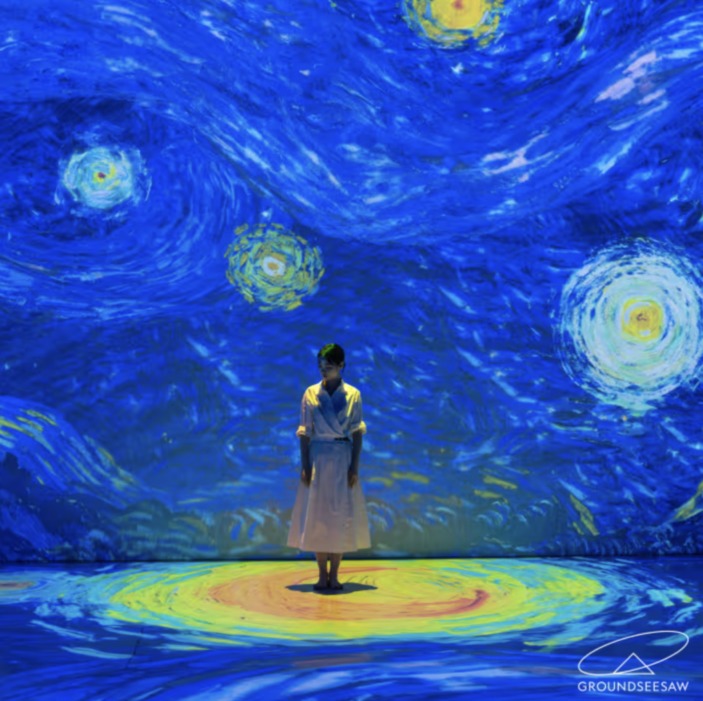 Family enjoying immersive Van Gogh projections at Parkview Square Singapore
