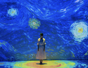 Family enjoying immersive Van Gogh projections at Parkview Square Singapore