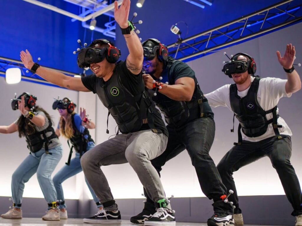 Friends playing interactive virtual reality game at Sandbox VR Singapore
