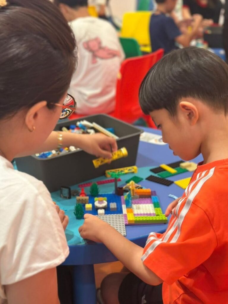 Image of boy playing with legos at Children's Museum Singapore - kid-friendly museum singapore