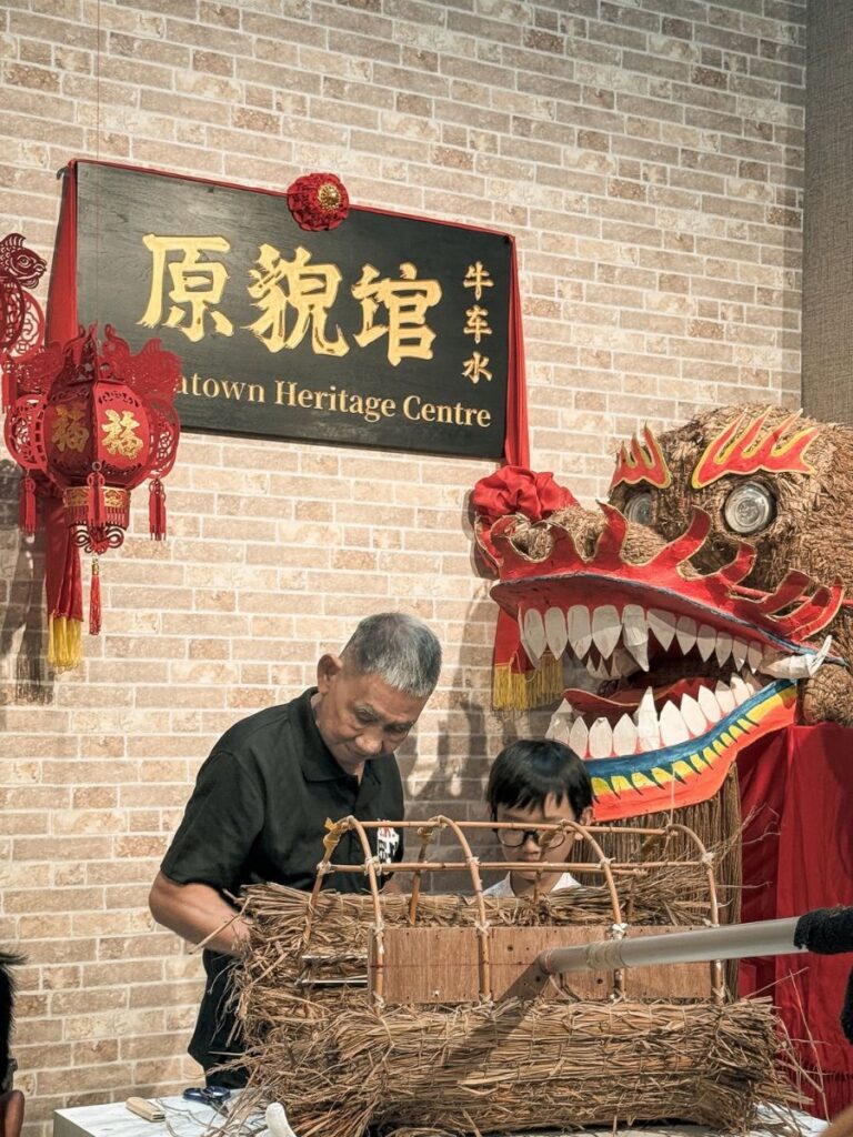 Image of grandfather and child at Chinatown Heritage Centre - kid-friendly museum singapore