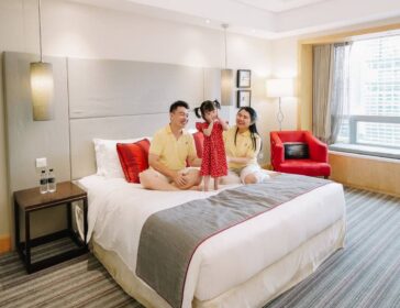 Spacious family-friendly premier room at Carlton Hotel Singapore near City Hall and Bugis