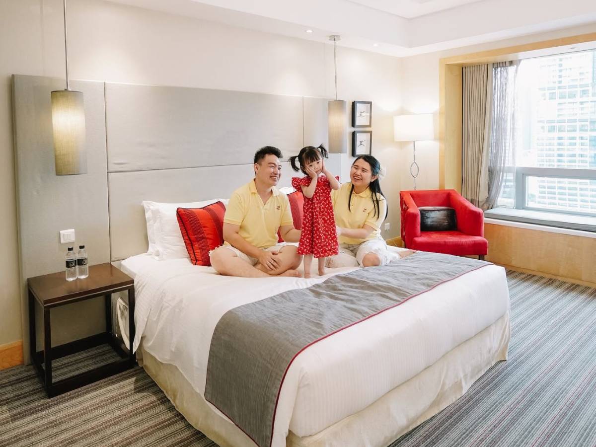 Spacious family-friendly premier room at Carlton Hotel Singapore near City Hall and Bugis