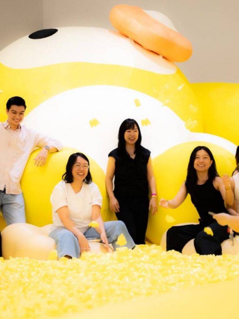 Image of juju world immersive inflatable art experience with giant yellow ball pit and slides at IMBA Theatre Singapore