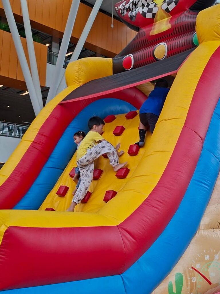 Image of bouncy castle at One Punggol - september holiday activities singapore
