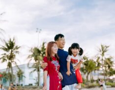 Image of an Asian family looking into the distance