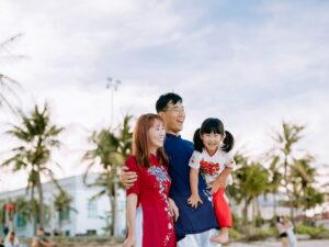 Image of an Asian family looking into the distance