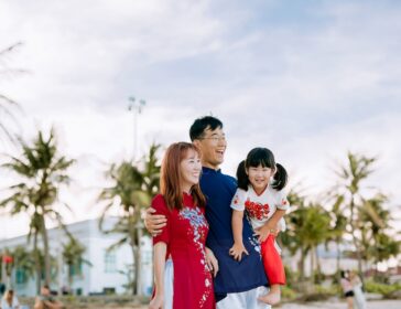 Image of an Asian family looking into the distance