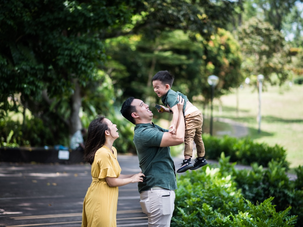 Image of Asian family in the park