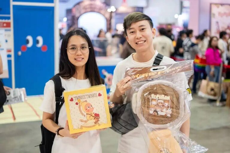 Visitors exploring POP TOY SHOW Singapore 2026 with POP MART collectibles and designer toy displays at Marina Bay Sands