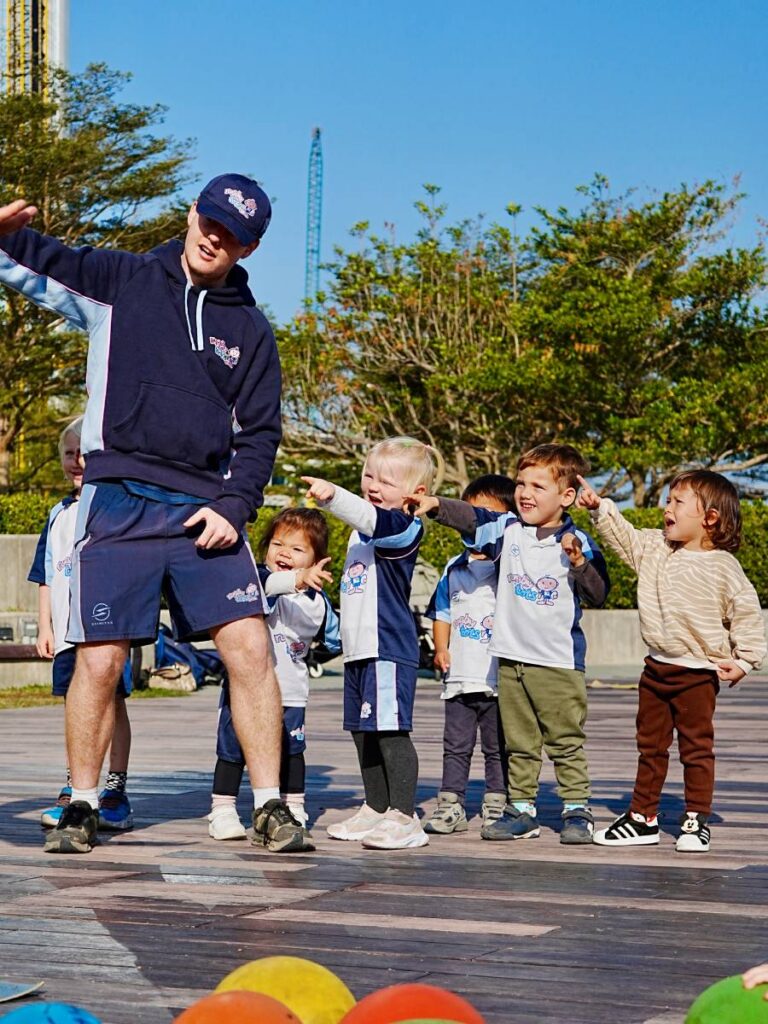 Children enjoying fun rugby and Halloween-themed activities at Rugbytots Hong Kong October half-term camp