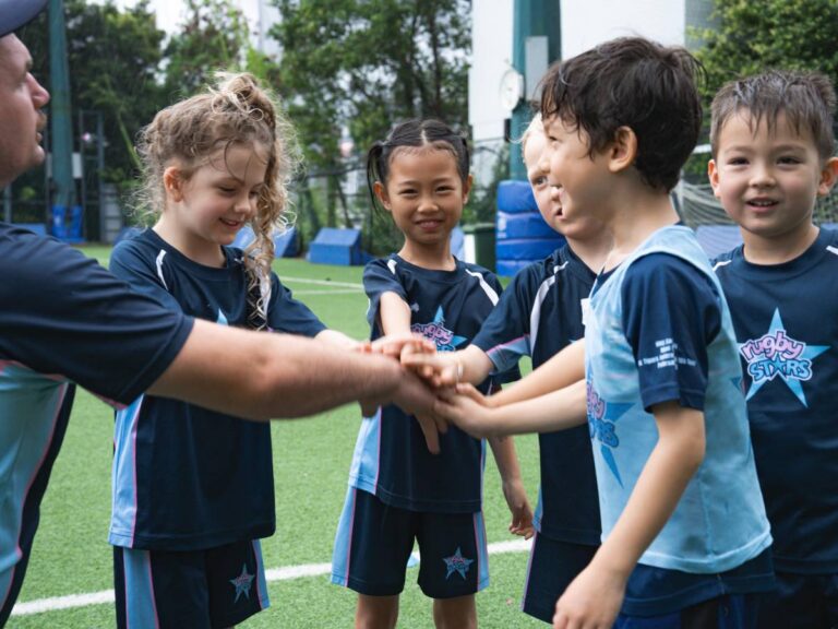 Children taking part in a fun Rugbytots rugby class in Hong Kong