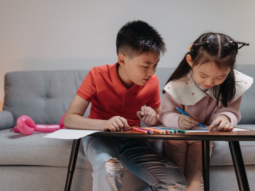 Image of boy and girl in living room - National Day Rally 2026