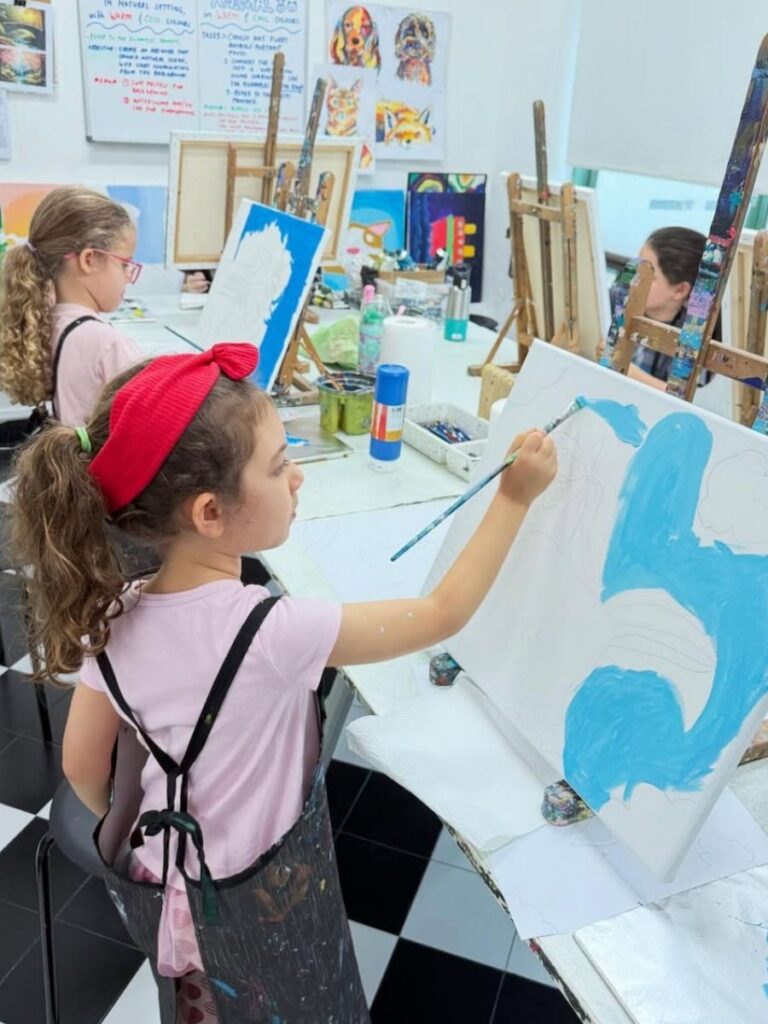 Image of girl painting - enrichment class singapore